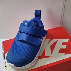 Blue and white nike star runners, size 5c